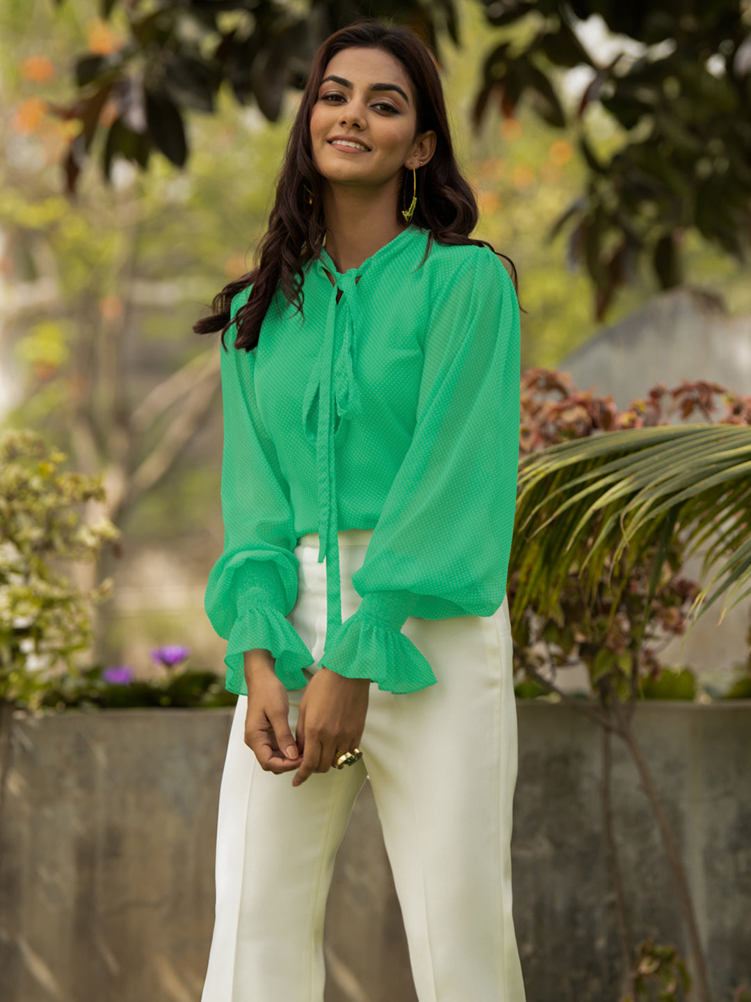 Stylish White Trousers and Green Shirt
